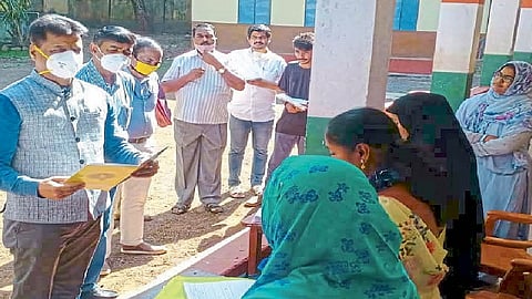 election centre check from collector in belgaum list of voters also done