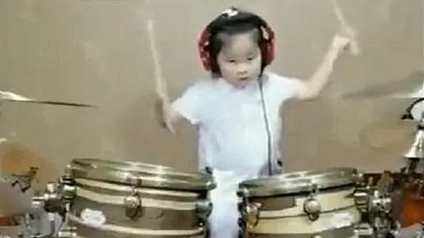 drum playing by girl