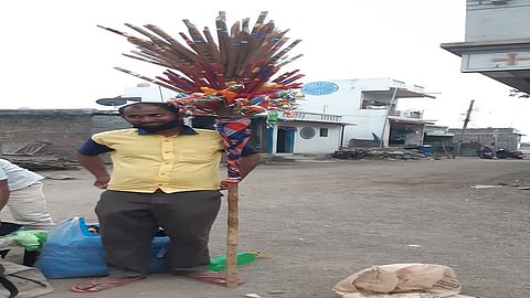 This year, the flute seller is looking for customers as there is no pilgrimage due to corona 3.jpg