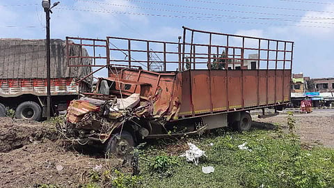 A truck collides with a standing truck