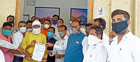 Trying to undress a woman for money