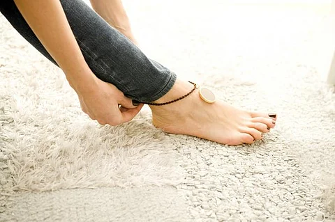 Why tie a black thread to the foot and hand read full story