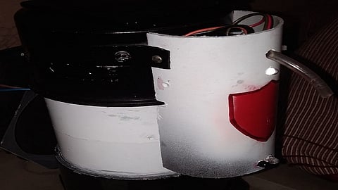 automatic hand sanitizer dispenser machine made by professor of electronics and two students studying engineering ratnagiri