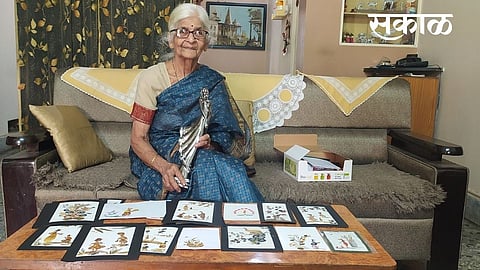 80 years old woman doing paintings using leaves of trees in Nagpur