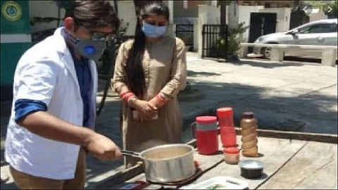 doctor selling tea with wife in front of hospital due to fired job at haryana