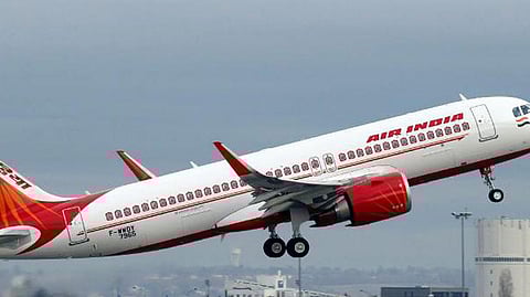 air india london mumbai flight passengers smoking cigarette also tried to open the emergency door