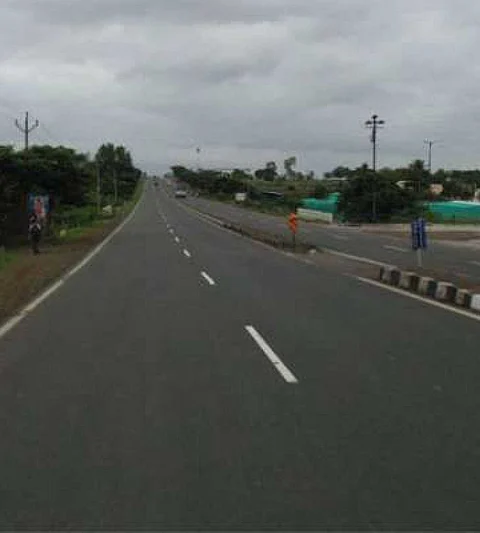 The state highway was demolished in many places even before the sidewalks were filled