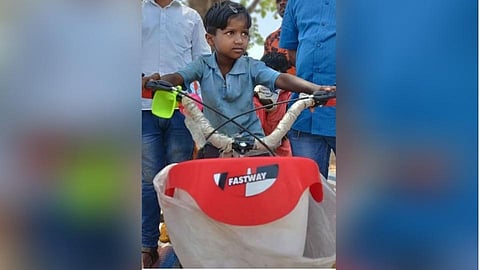 Kisan Gawande, a four-year-old boy from Kombhalane village, cried when his bicycle caught fire.jpg