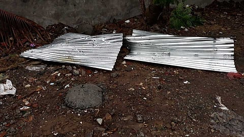 shade for garbage fell down