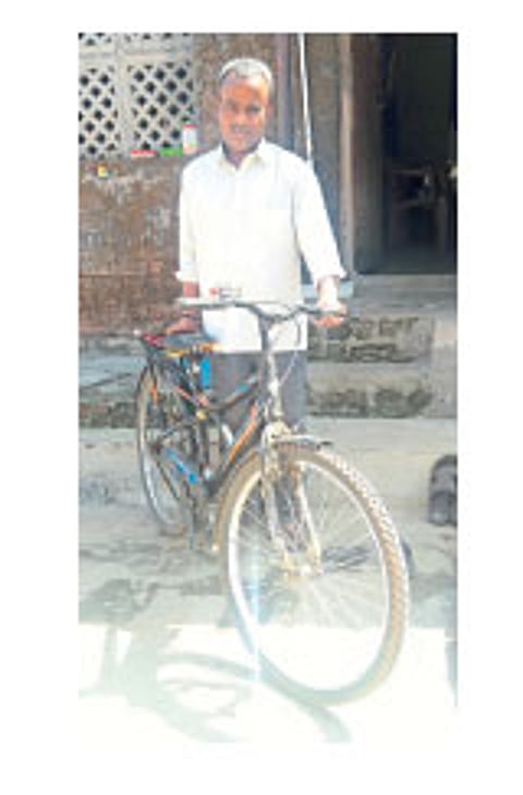 After working in the courier service father has taken on the responsibility of educating his children