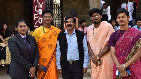 boys wears sari on sari day at Ferguson college pune.jpg