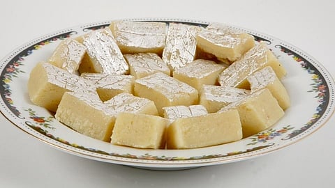 tips of sweet paneer burfi made by home in kolhapur
