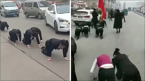China company forces employees to crawl on road as punishment