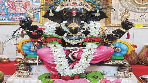 the red and black color ganesh idol in belgaum
