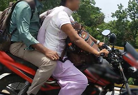 girl_student_on_bike