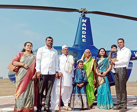 The grandchildren took the grandfather on a helicopter trip