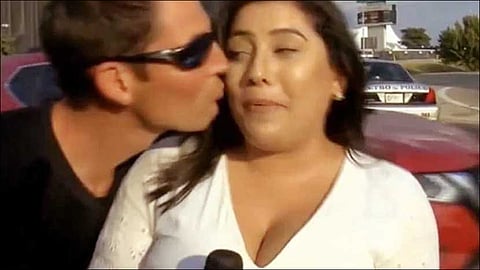 Man who kissed reporter on live TV charged with harassment