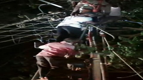 electric shock caused the wireman to stick to the pole