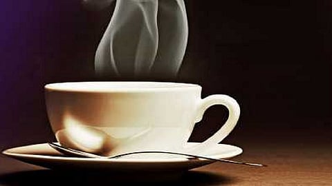 three youth together inventories a automatic tea machine in kolhapur as a start up