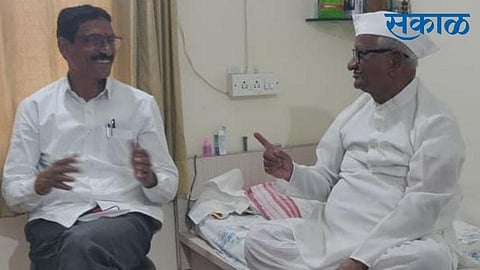 Senior social activist Annasaheb Hazare has advised Popatrao Pawar to continue the development of the village with the village in mind.jpg