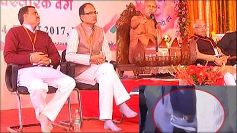 Shivraj Singh Chouhan's aide caught on camera carrying his shoes