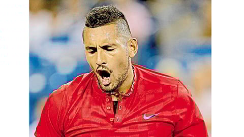 मॅसन, ओहायो - रॅफेल नदालविरुद्ध चुरशीच्या रॅलीत गुण जिंकल्यानंतर जिगर दर्शविताना ऑस्ट्रेलियाचा नीक किर्गीऑस.