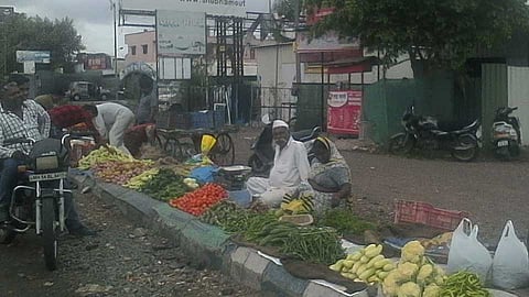 vegetable market fills on footpath at Chinchwade Nagar