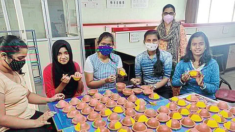 Solar powered lamps made by DKTE students