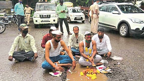 worship in the pit in front of the zp President's bungalow