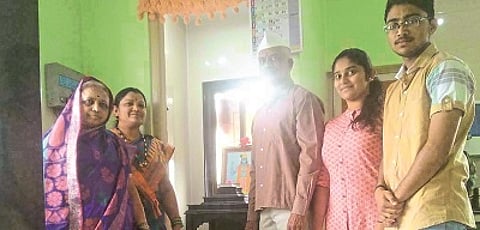 A youth from Shirol wWorshiping soil of the chartapati Shivaji Maharaj's forts