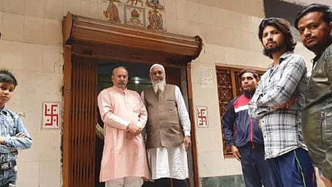 delhi riots hindu families saved muslim families and their shops