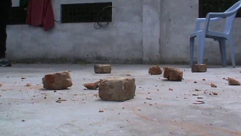 Stone throwing in two groups
