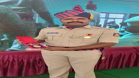 Gold medal to Constable Shekhar Asode nipani