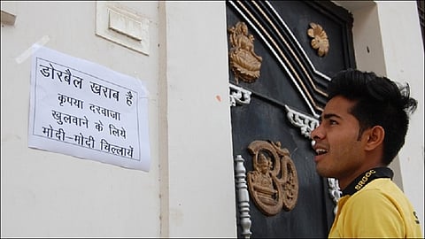 Doorbell is not working Shout Modi Modi People Stick posters outside their house at madhya pradesh