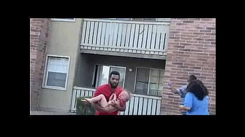 phillip blanks saves child from burning apartment video viral
