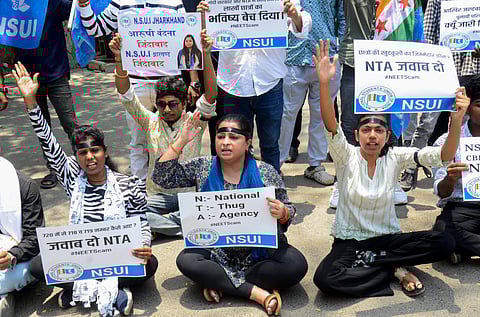 Students stage a protest outside the Ministry of Education over the alleged irregularities in NEET 2024 results