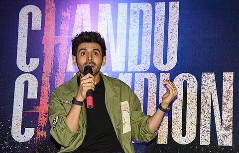 Actor Kartik Aaryan addresses a press conference during the promotion of his upcoming film