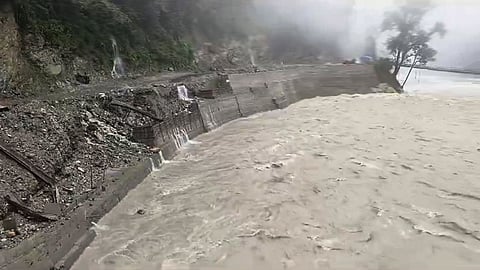 A river in spate at a flood-hit area of Sikkim