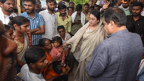 Family members of fire victims block the gates of the Chamundi Explosive factory demanding compensations, near Nagpur