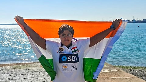 16-year-old Jiya Rai having Autism Spectrum Disorder, with the tricolor after becoming the youngest para swimmer to cross the English Channel
