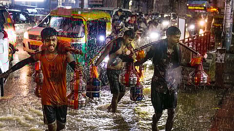 Heavy rains paralyze Delhi, IMD issues 'red' warning