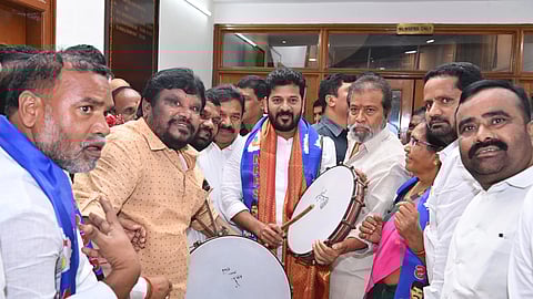 Telangana Chief Minister A Revanth Reddy, state Minister Damodara Rajanarsimha and other party MLAs celebrate after the Supreme Court verdict