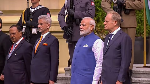 PM Narendra Modi with his Polish counterpart Donald Tusk during his ceremonial welcome at the Chancellery, in Warsaw, Poland