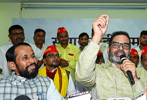 Jan Suraaj convenor Prashant Kishor along with newly joined party leader Devendra Prasad Yadav