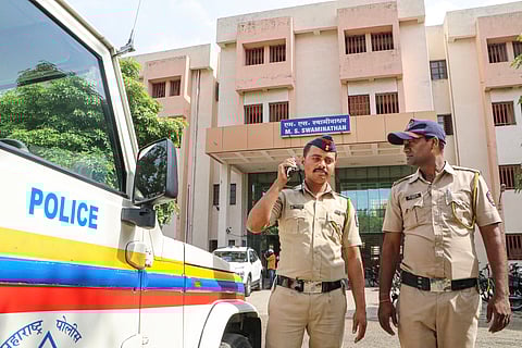 Police personnel during investigation at a hostel where a student Divyanshu Gautam allegdlly died by suicide, at VNIT in Nagpur