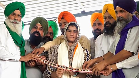 Olympian Vinesh Phogat being felicitated at a farmers' rally on the 200th day of their ongoing protest