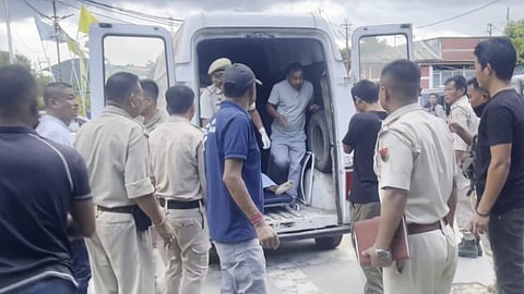 Police personnel shift injured to a hospital after suspected Kuki militants attacked Koutruk villagers, in Imphal. Two people were killed and nine others were injured in the attack.