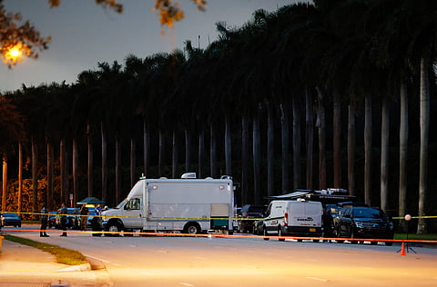 Police crime scene vehicles are seen at Trump International Golf Club after police closed off the area following the apparent assassination attempt of former President Donald Trump