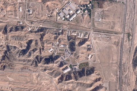 This satellite photo from Planet Labs PBC shows damaged buildings at Iran's Parchin military base outside of Tehran, Iran