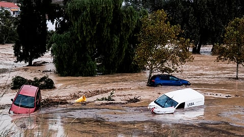 Flash floods turn Valencia streets into rivers, 63 dead